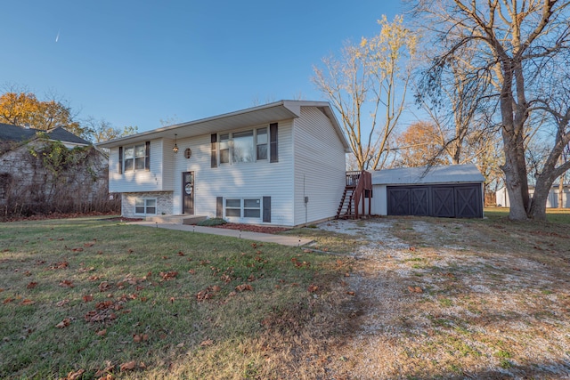 view of front of home with a shed and a front lawn