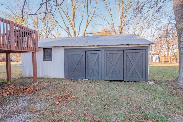 view of outdoor structure with a lawn