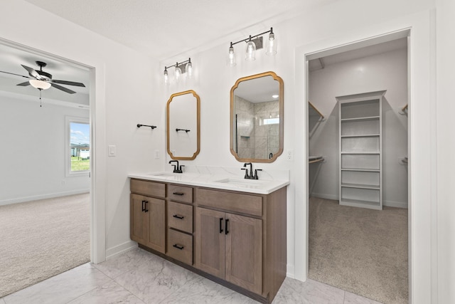 bathroom featuring vanity and ceiling fan