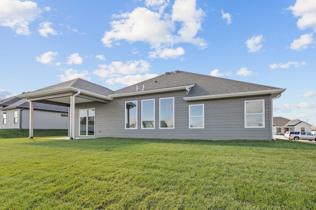 LOT523 The Brks, Columbia, MO 65201 - back of house featuring a yard and roof with shingles