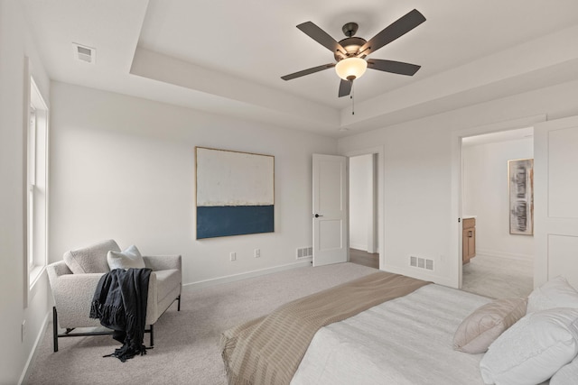 LOT523 The Brks, Columbia, MO 65201 - bedroom featuring light colored carpet, baseboards, a raised ceiling, and ceiling fan