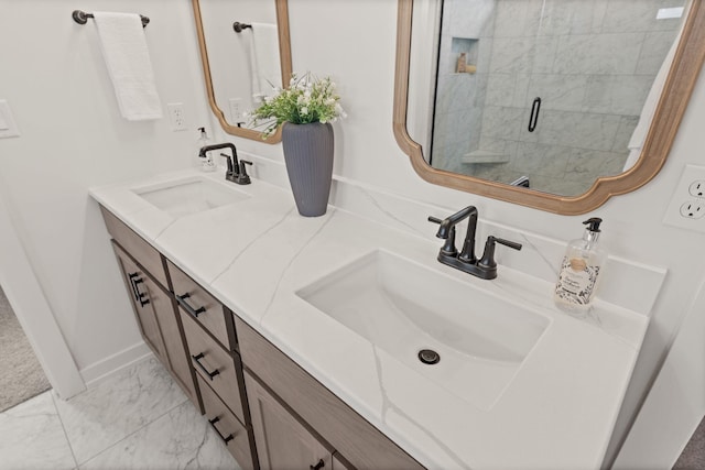 LOT523 The Brks, Columbia, MO 65201 - bathroom with double vanity, a shower stall, and marble look tile flooring