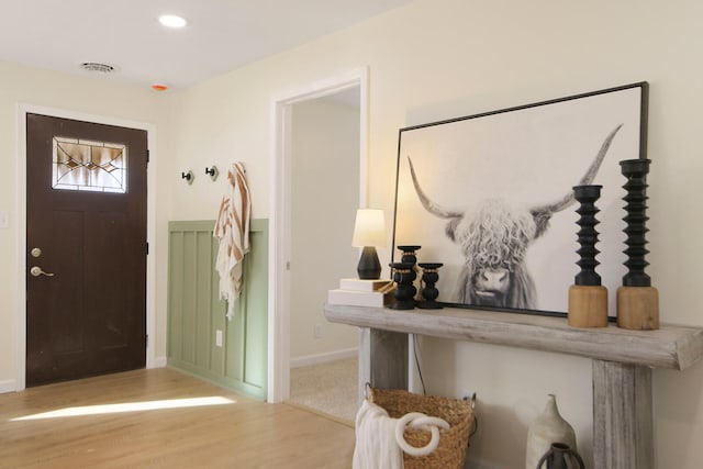 foyer featuring wood-type flooring