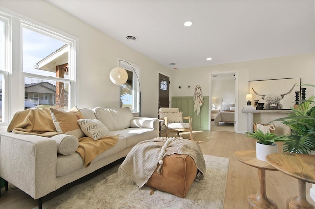 living room with light hardwood / wood-style floors