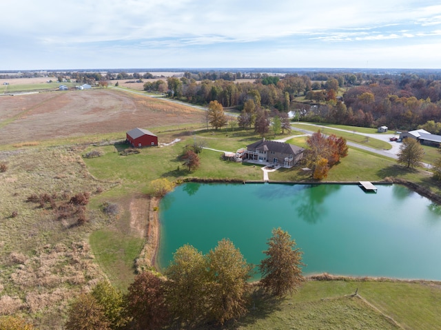 drone / aerial view featuring a rural view and a water view