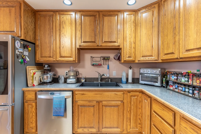 kitchen with appliances with stainless steel finishes and sink