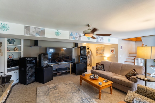 carpeted living room with ceiling fan