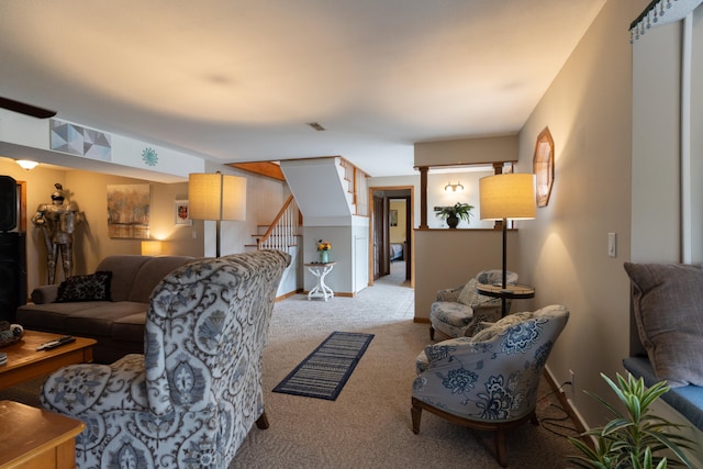 living room with light colored carpet