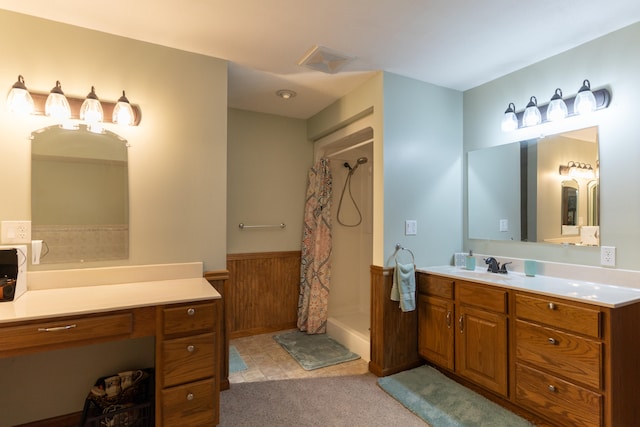 bathroom featuring walk in shower, vanity, and wooden walls