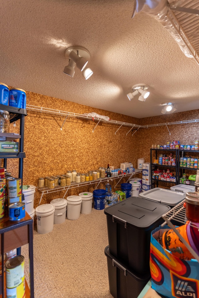 miscellaneous room featuring a textured ceiling