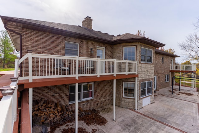 rear view of property featuring a patio