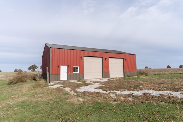 view of outbuilding with a garage