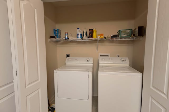 laundry room with washer and dryer