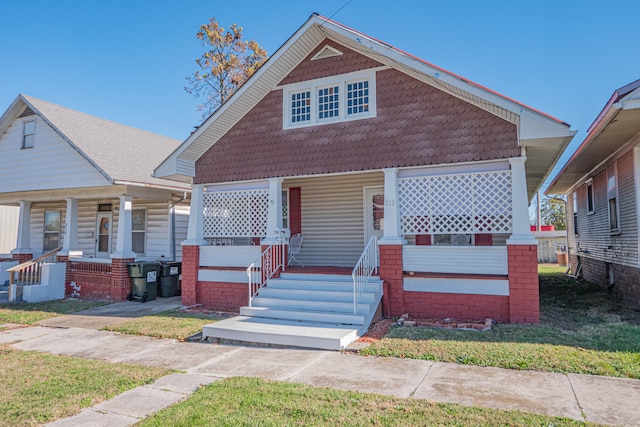 bungalow featuring covered porch