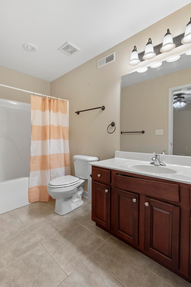 full bathroom featuring vanity, shower / bath combination with curtain, tile patterned flooring, ceiling fan, and toilet