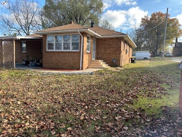 view of property exterior featuring a yard