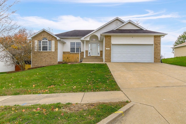 view of front facade featuring a garage and a front lawn