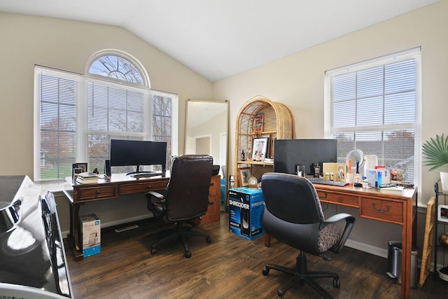 office space with vaulted ceiling and dark hardwood / wood-style floors