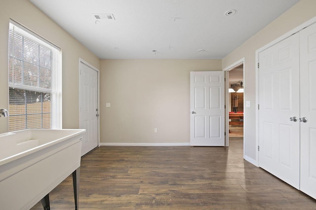 interior space featuring dark wood-type flooring