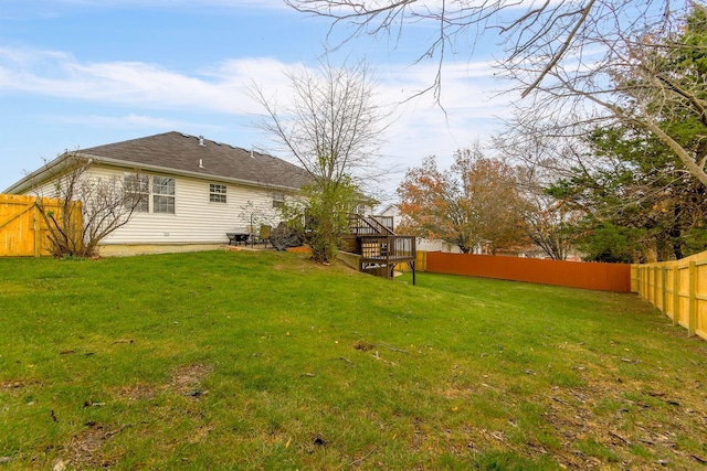 view of yard with a wooden deck