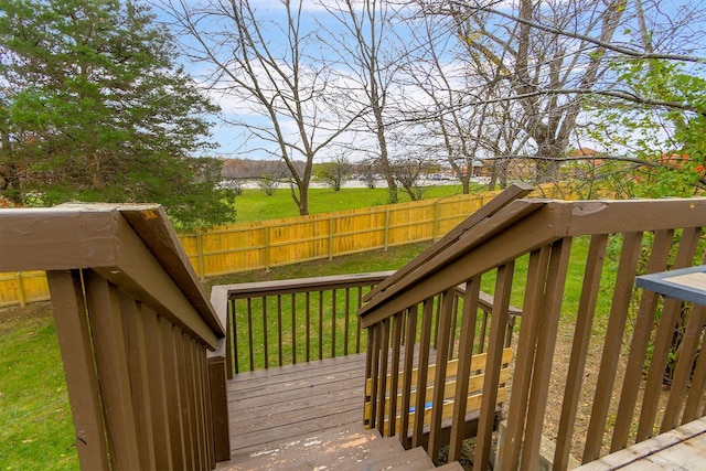 deck featuring a lawn