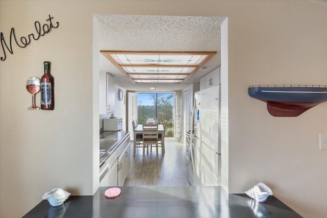 interior space with hardwood / wood-style floors and sink