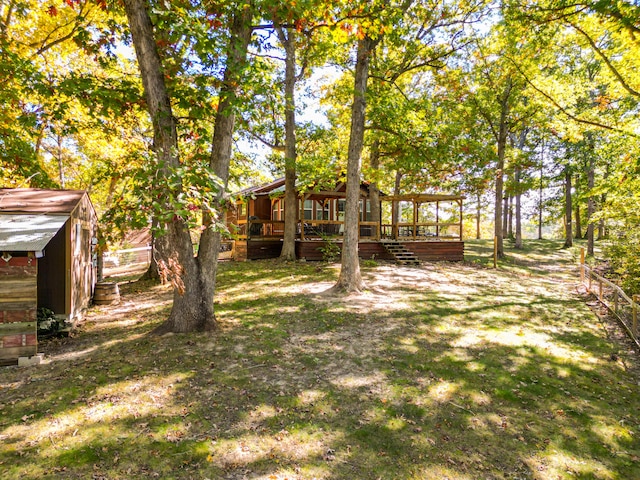 view of yard with a deck