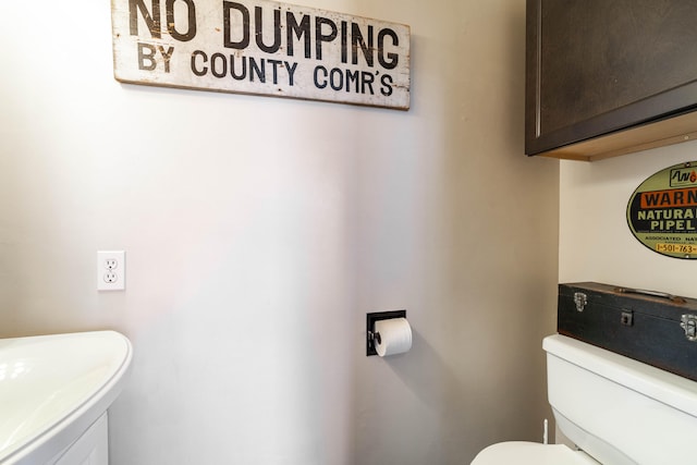 bathroom featuring toilet