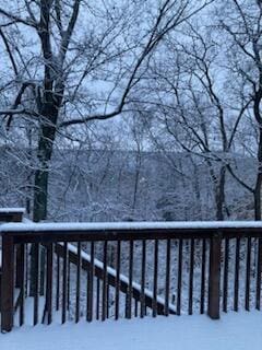 view of snow covered deck