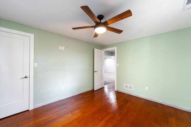 unfurnished bedroom featuring ceiling fan and hardwood / wood-style floors