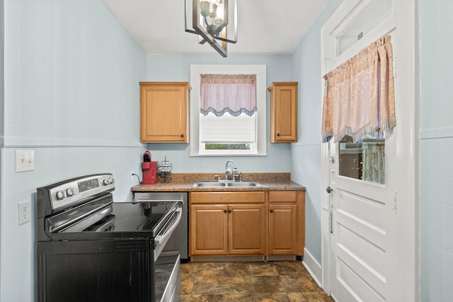 kitchen with an inviting chandelier, stainless steel electric stove, and sink