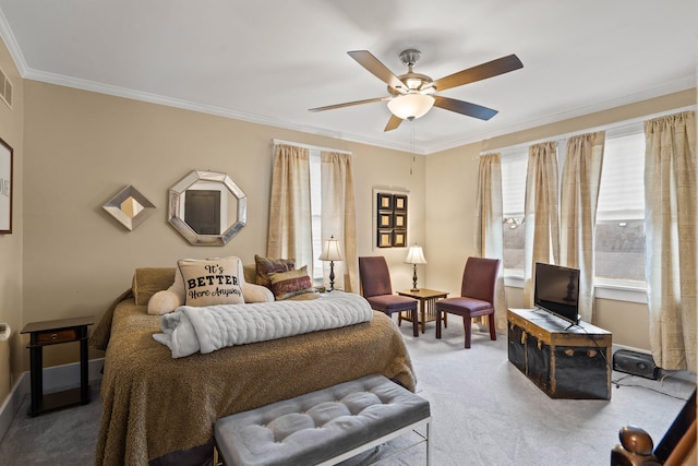 bedroom with carpet, ceiling fan, and ornamental molding