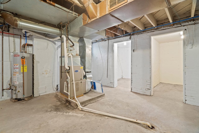 basement with gas water heater and heating unit