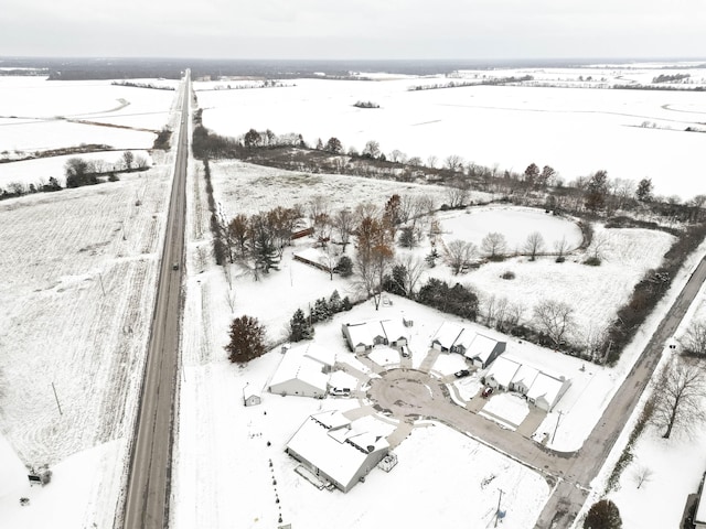 snowy aerial view with a rural view