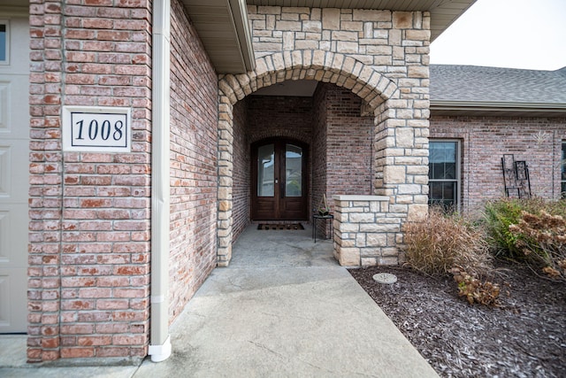 entrance to property featuring french doors