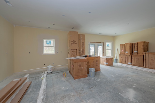 kitchen featuring plenty of natural light, a center island, and french doors