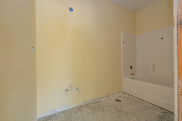 bathroom with concrete flooring