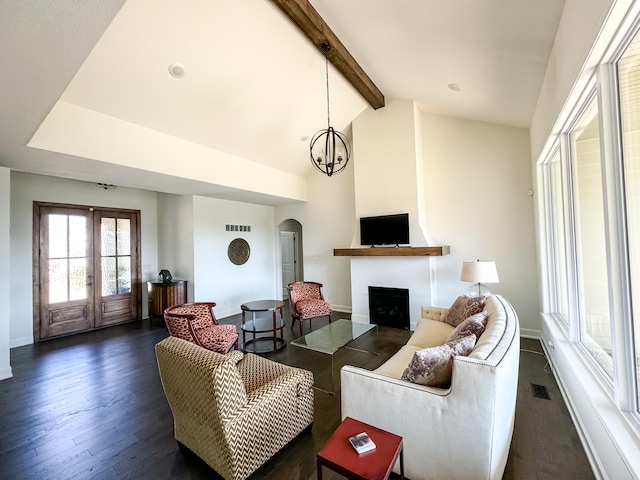 living room with french doors, lofted ceiling with beams, dark hardwood / wood-style floors, and a notable chandelier