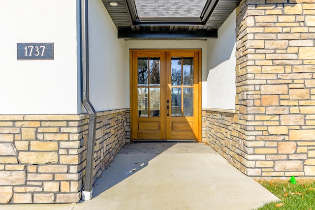 entrance to property featuring french doors