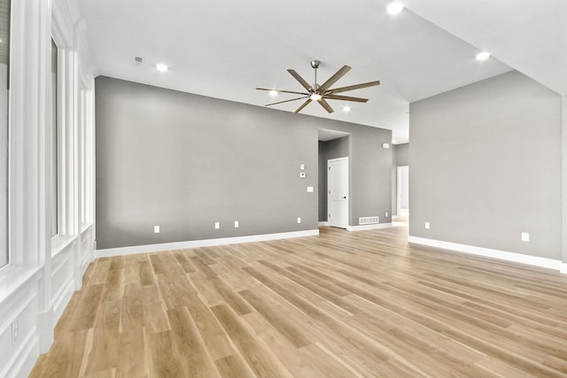 empty room featuring light wood-type flooring and ceiling fan