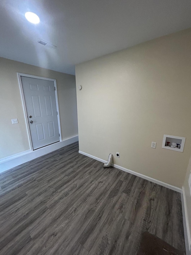 clothes washing area with electric dryer hookup, dark hardwood / wood-style flooring, and washer hookup