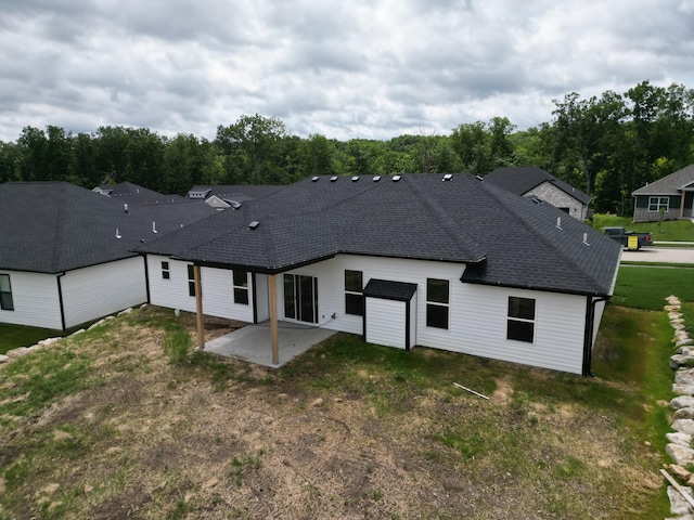 rear view of house featuring a patio area