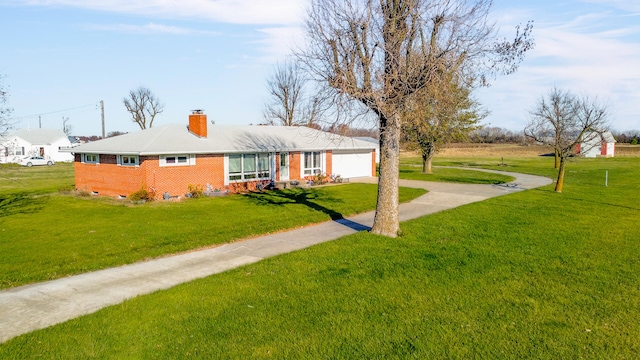 single story home with a garage and a front lawn