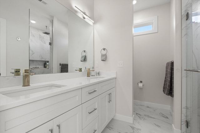 bathroom with vanity and walk in shower