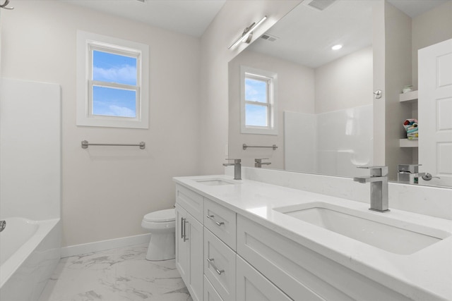 full bathroom with vanity, toilet, plenty of natural light, and tub / shower combination