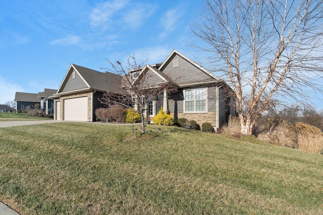 view of front of home featuring a garage and a front lawn