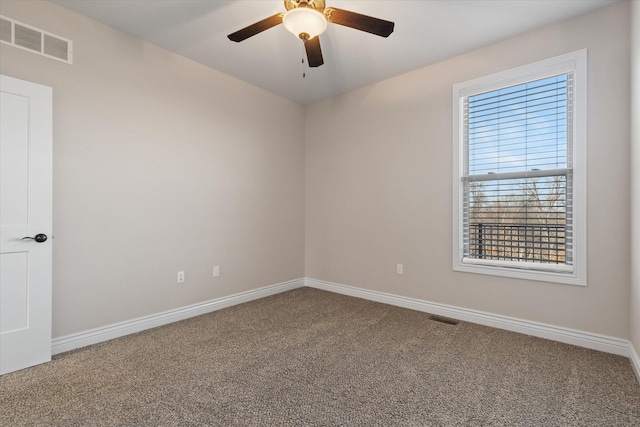 unfurnished room featuring carpet floors and ceiling fan