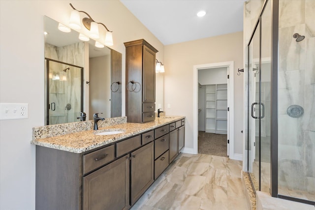 bathroom featuring vanity and walk in shower