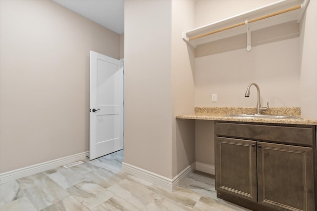 laundry area featuring sink