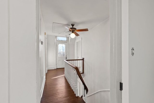 corridor featuring dark hardwood / wood-style flooring